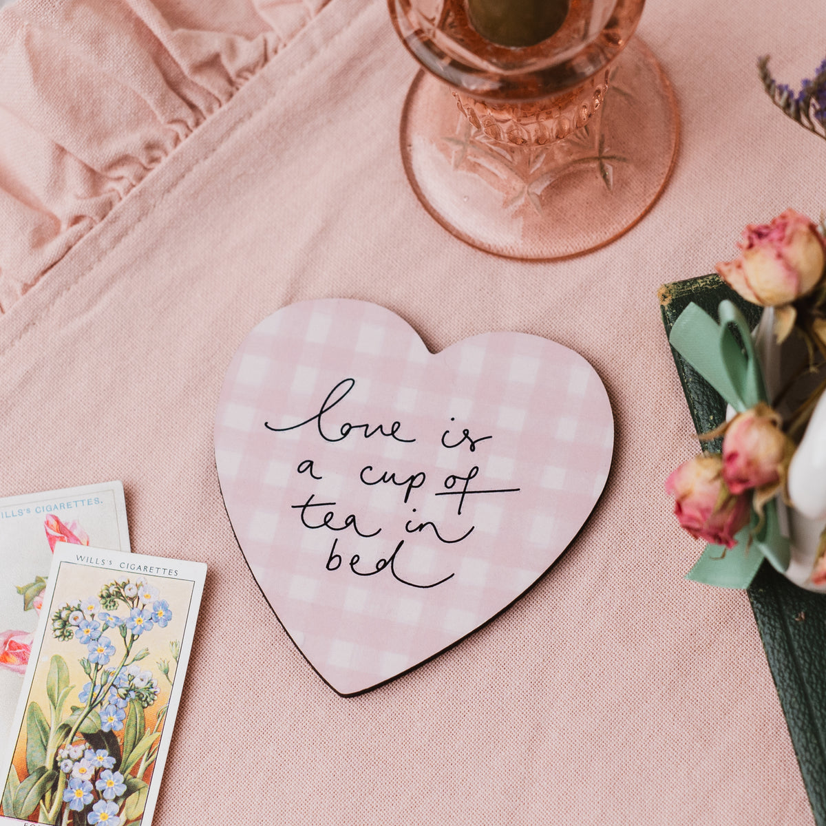 ‘Love is a cup of tea in bed’ Gingham Heart Shaped Coaster